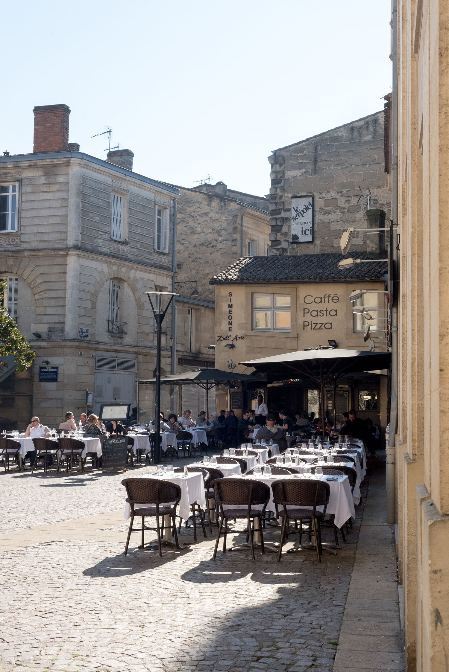Outdoor cafes in Bordeaux, France, as photographed by top Canadian travel blogger Cee Fardoe of Coco & Vera