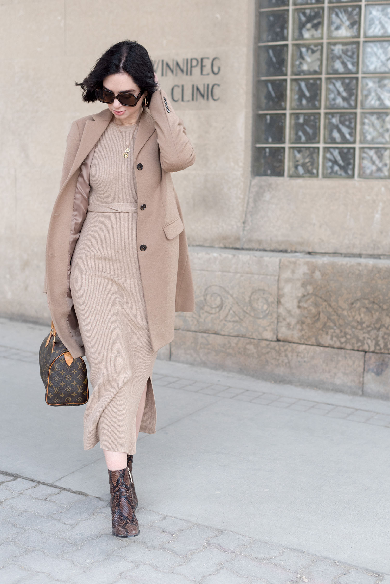 Top Winnipeg fashion blogger Cee Fardoe of Coco & Vera wears a Mango ribbed dress and Uniqlo camel coat