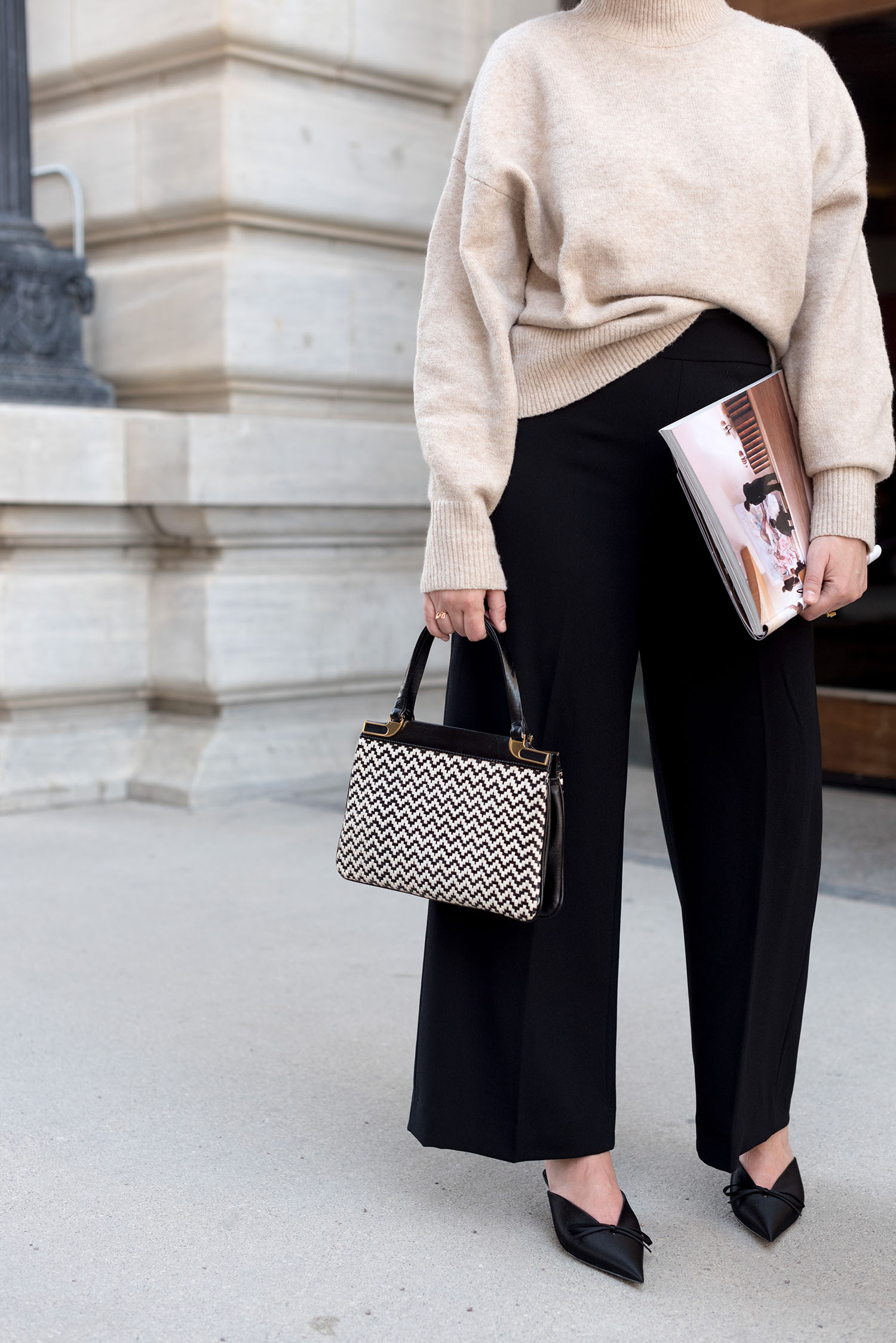 Outfit details on top Canadian fashion blogger Cee Fardoe of Coco & Vera, who carries a copy of Vogue magazine, including Balenciaga satin knife pumps and a vintage handbag