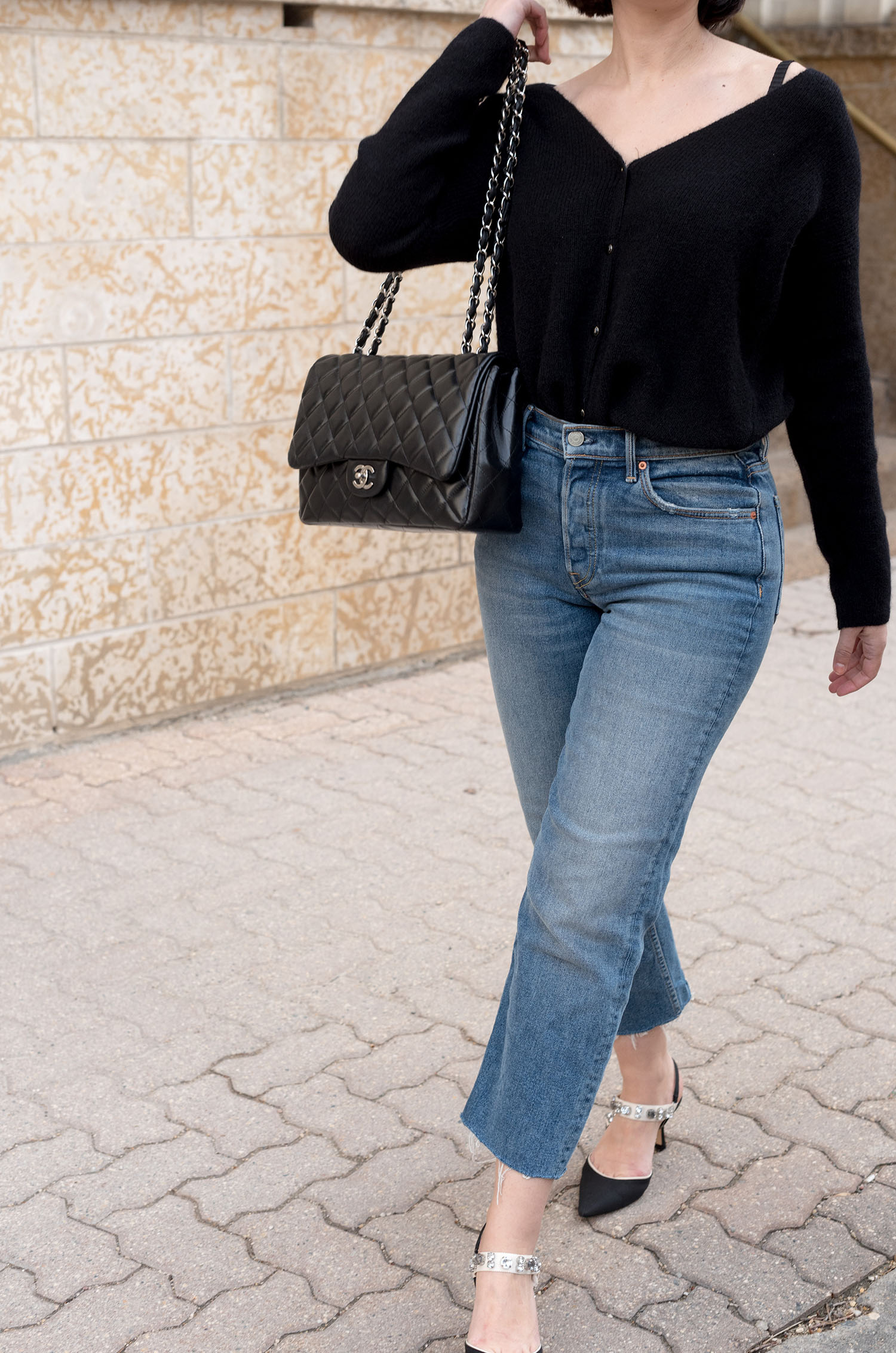Outfit details on top Canadian fashion blogger Cee Fardoe of Coco & Vera, including a Chanel jumbo quilted handbag and Grfrnd Helena jeans