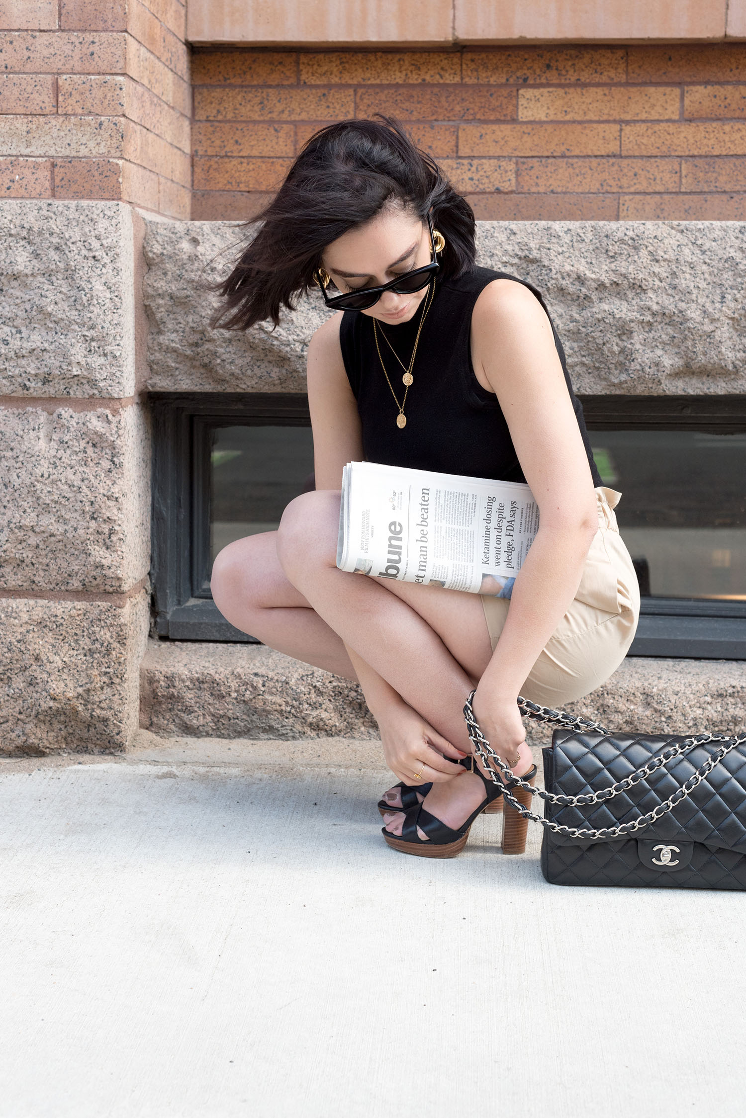 Top Canadian fashion blogger Cee Fardoe of Coco & Vera wears Le Chateau platform sandals and carries a Chanel jumbo quilted handbag
