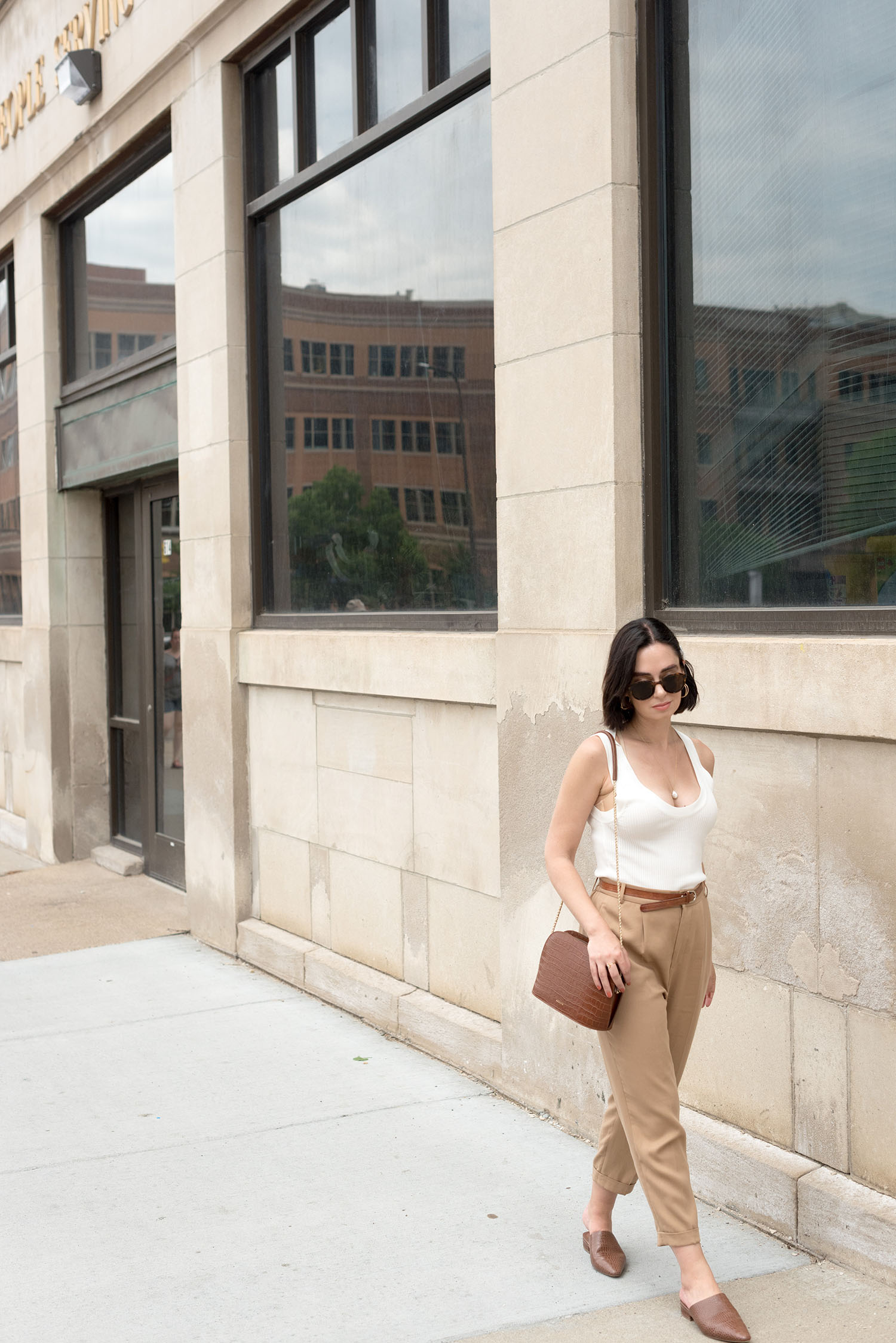 Top Canadian fashion blogger Cee Fardoe of Coco & Vera in Minneapolis, wearing Zara trousers and & Other Stories sunglasses