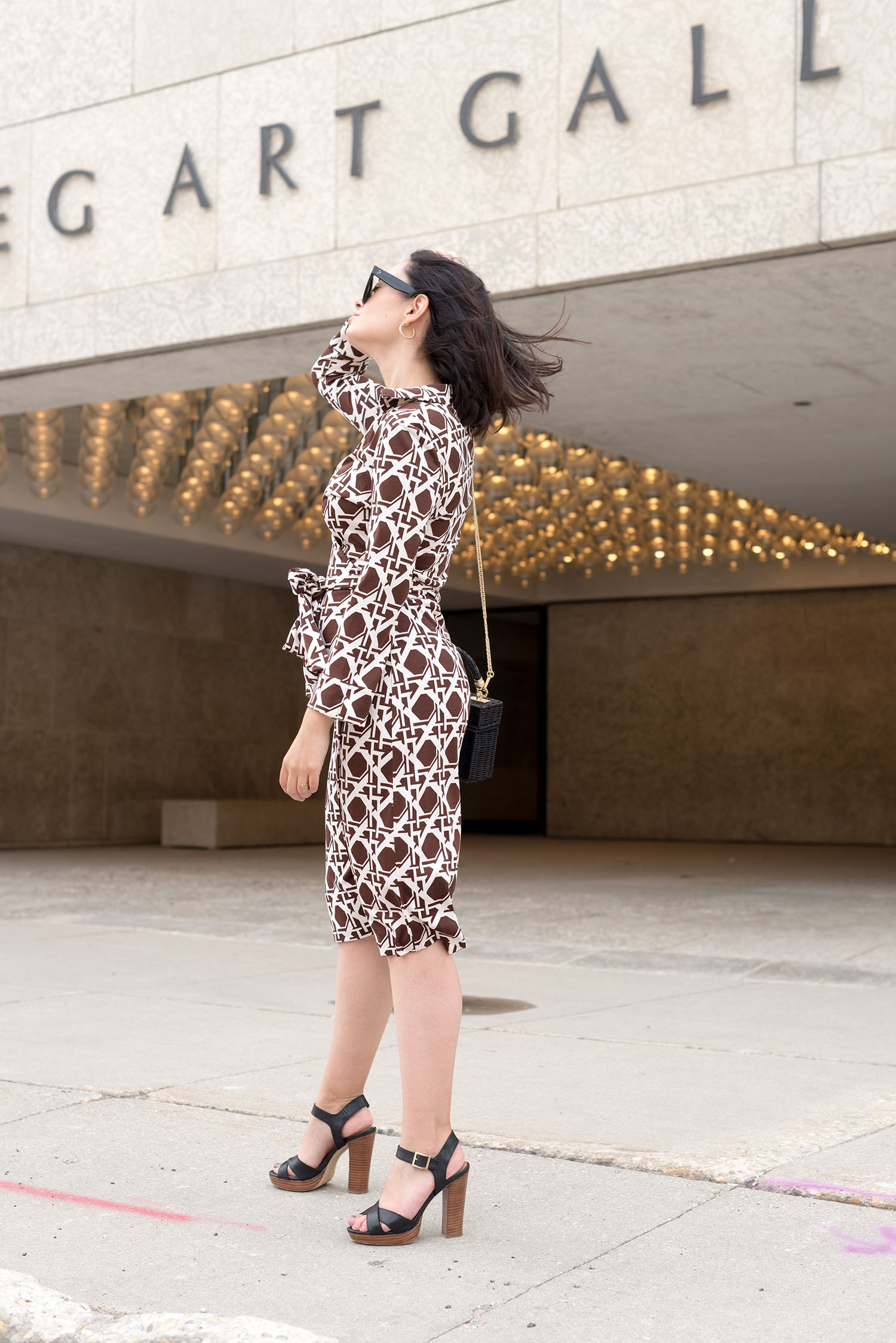 Top Canadian fashion blogger Cee Fardoe of Coco & Vera at the Winnipeg Art Gallery, wearing a vintage DVF dress and Le Chateau sandals