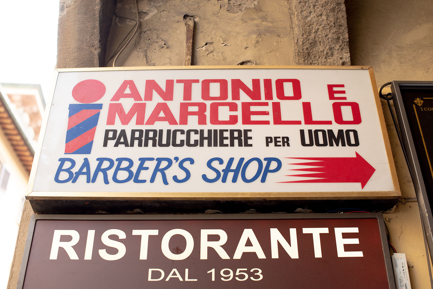 Coco & Vera - Vintage barbershop sign in Florence, italy
