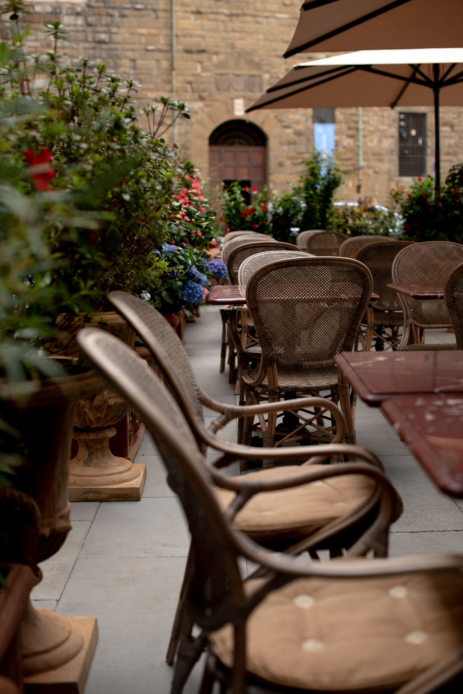 Coco & Vera - Brown chairs at Gucci Giardino 25 restaurant in Florence