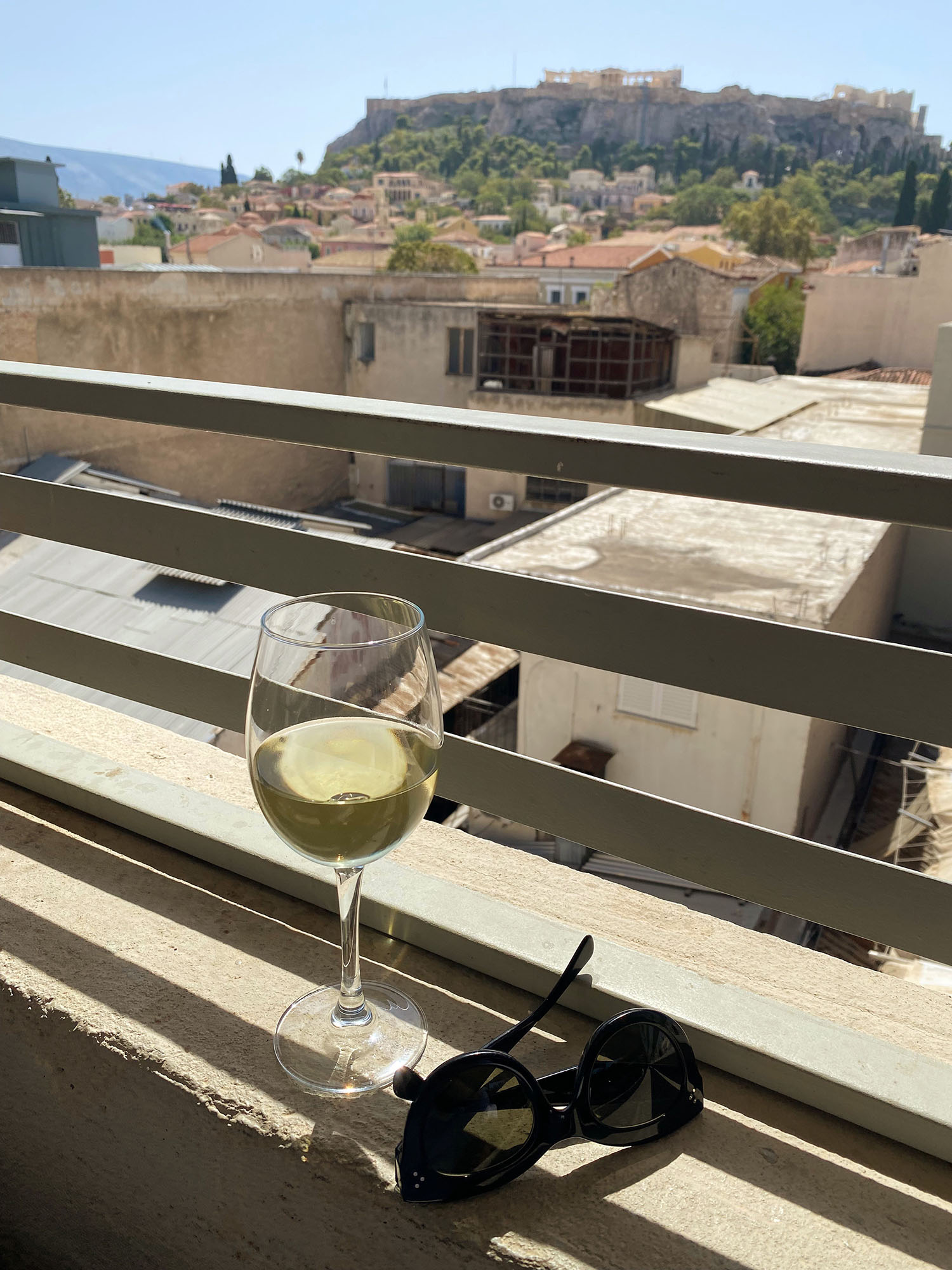 Coco & Vera - White wine and Celine sunglasses at Couleur Locale overlooking Acropolis in Athens