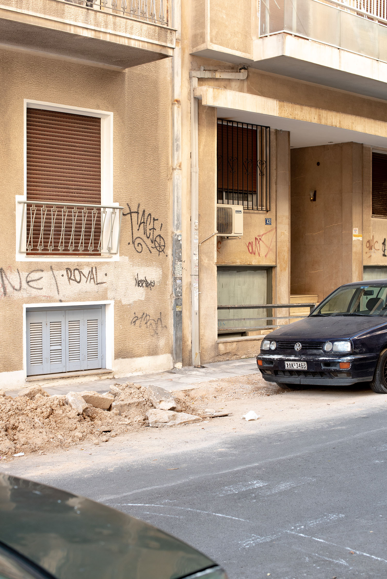 Coco & Vera - Car parked in front of a building in Attiki, Athens, Greece