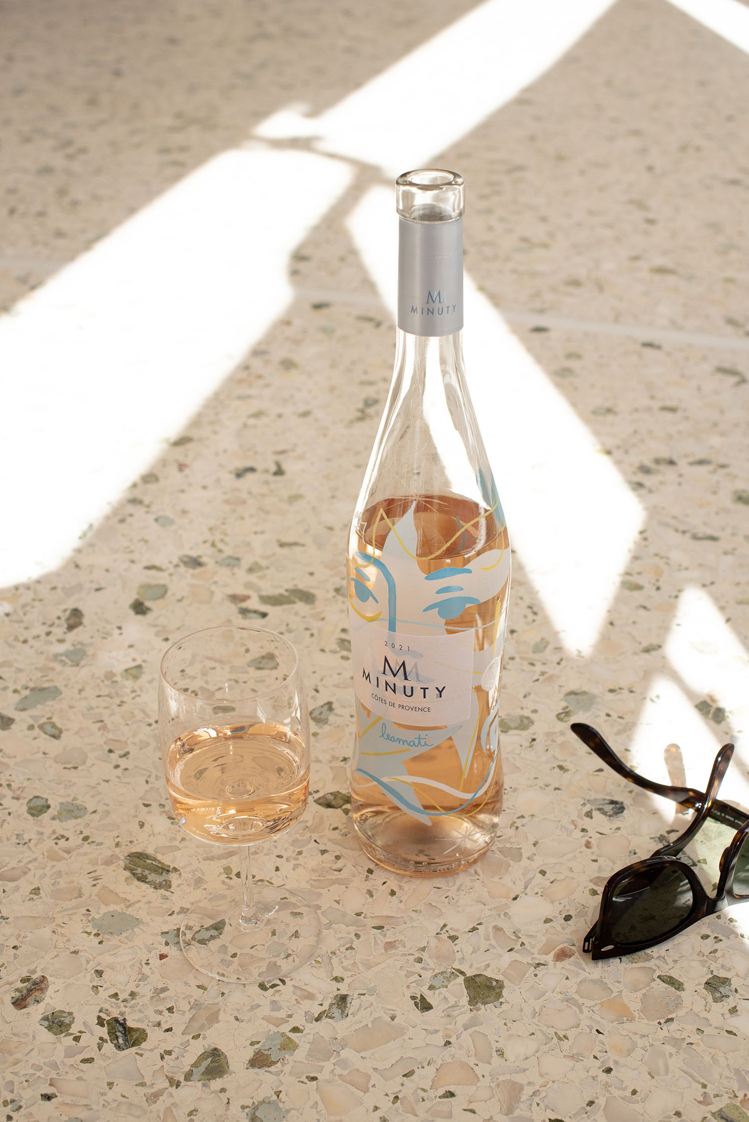 Coco & Vera - Minuty Rosę wine bottle and glass, RayBan Wayfarer sunglasses