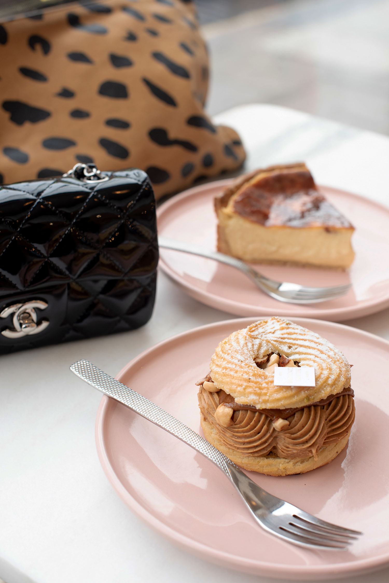 Coco & Vera - Two pastries on pink plates at Philippe Conticini in Camden