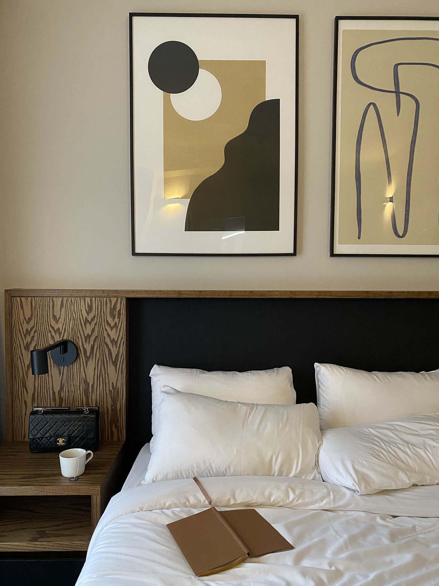 Coco & Vera - Graphic art above bed and Smythson notebook on bed at Sonder - The Earl in Dublin