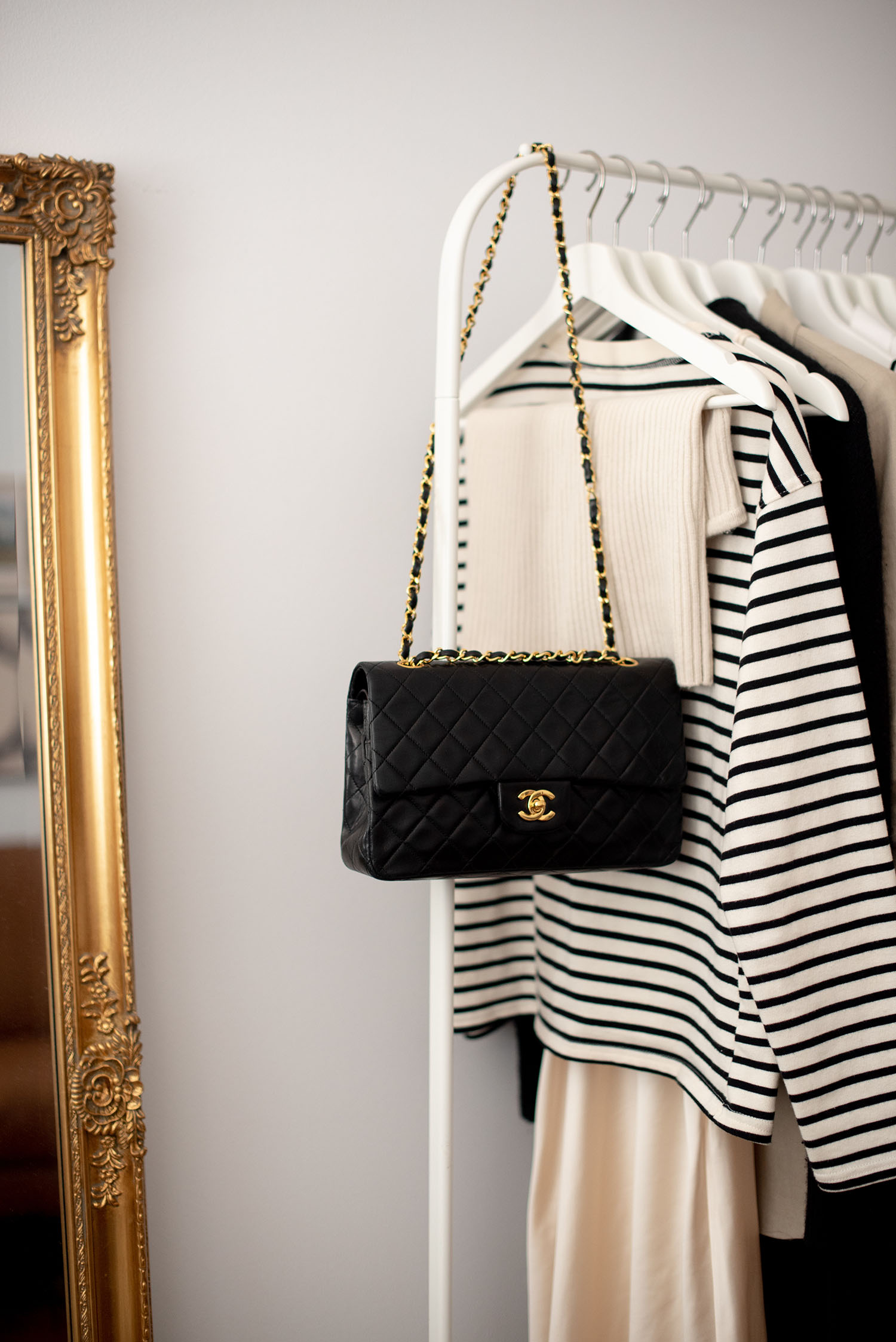 Coco & Voltaire - Chanel double flap handbag, Almada Label tube top, Zara striped shirt