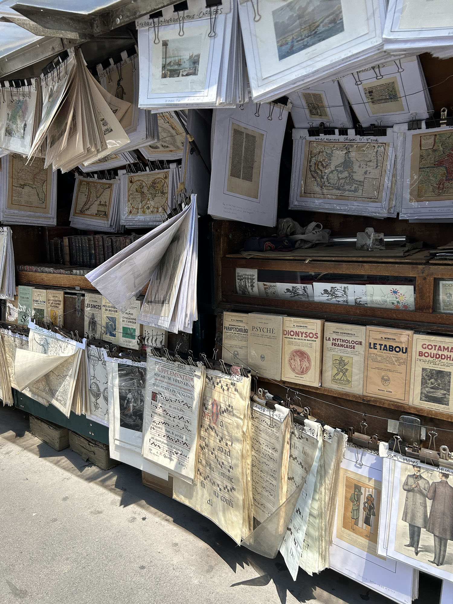 Coco & Voltaire - Vintage books and posters at a bouquiniste shop along the left bank of the Seine in Paris