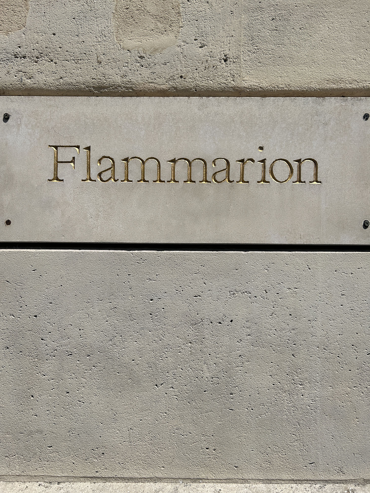 Coco & Voltaire - Flammarion sign in Paris, France