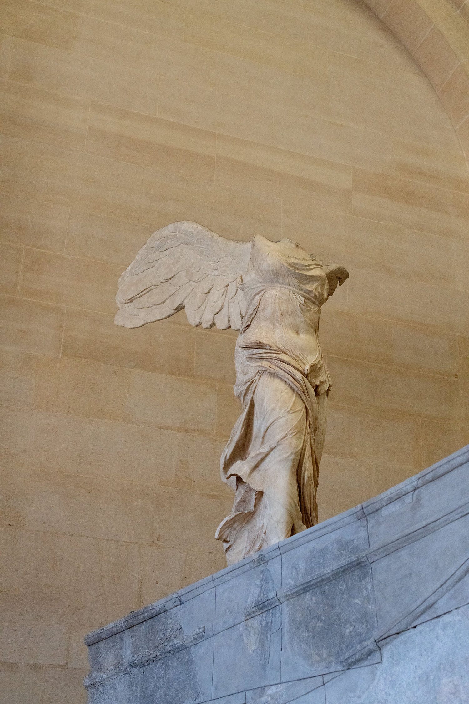 Coco & Voltaire - Winged Victory of Samothrace at the Louvre Museum in Paris