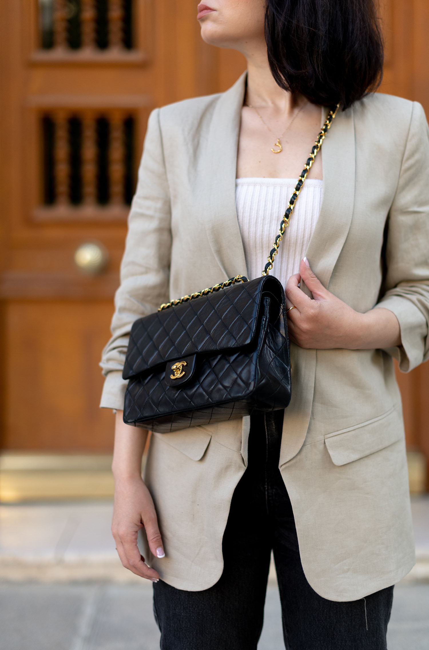 Coco & Voltaire - Chanel quilted handbag, Zara blazer, Almada Label top