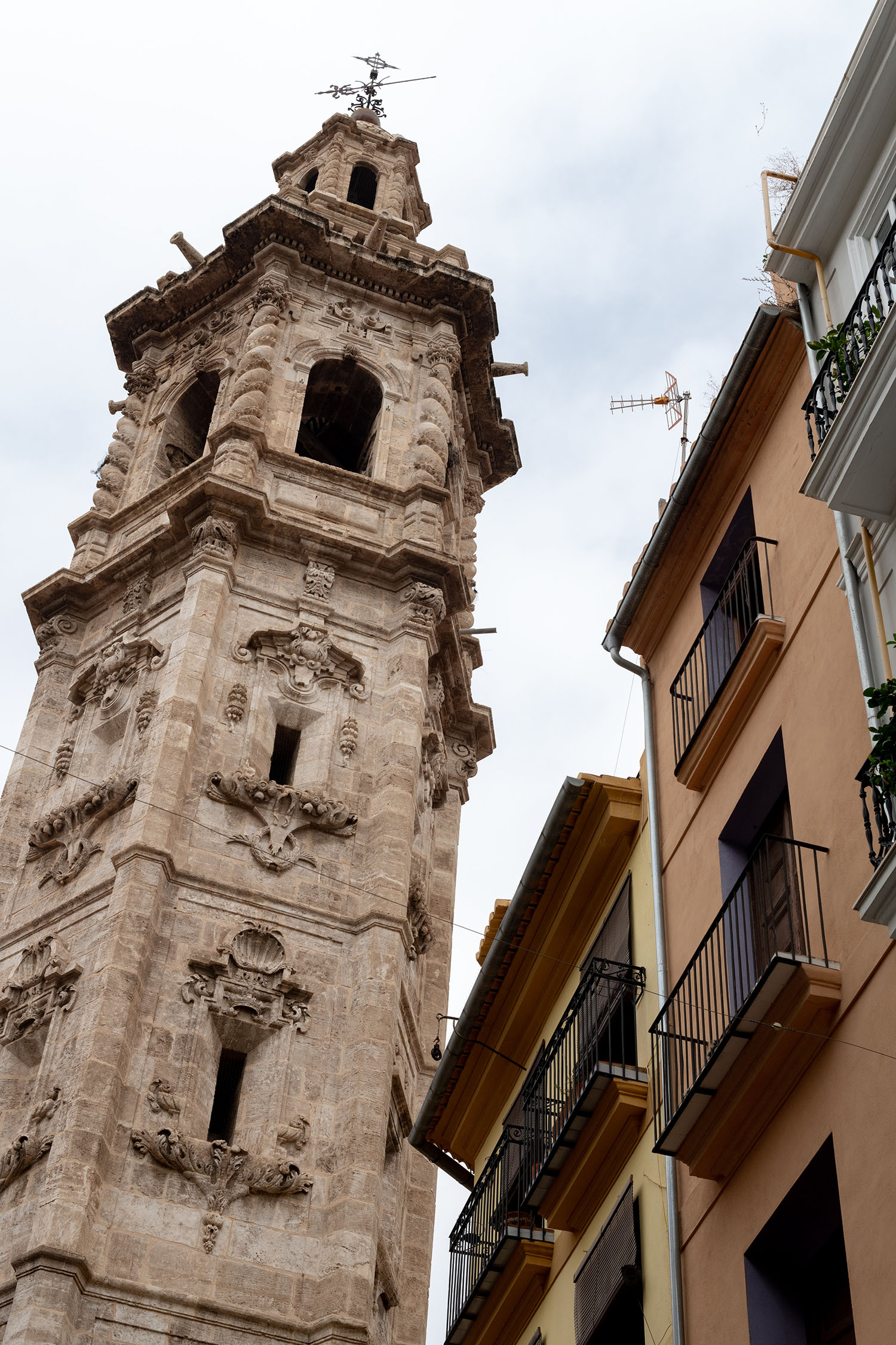 Coco & Voltaire - Cathedral tower and residential buildings in Valencia