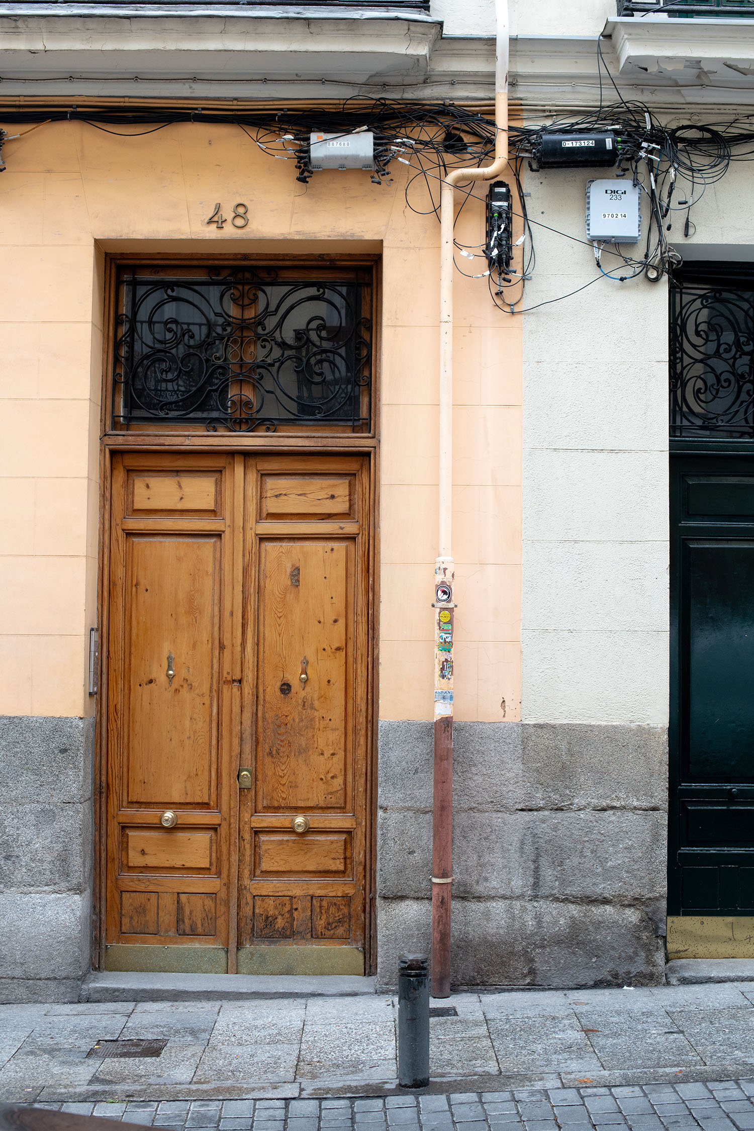 Coco & Voltaire - Apartment doors in Madrid, Spain