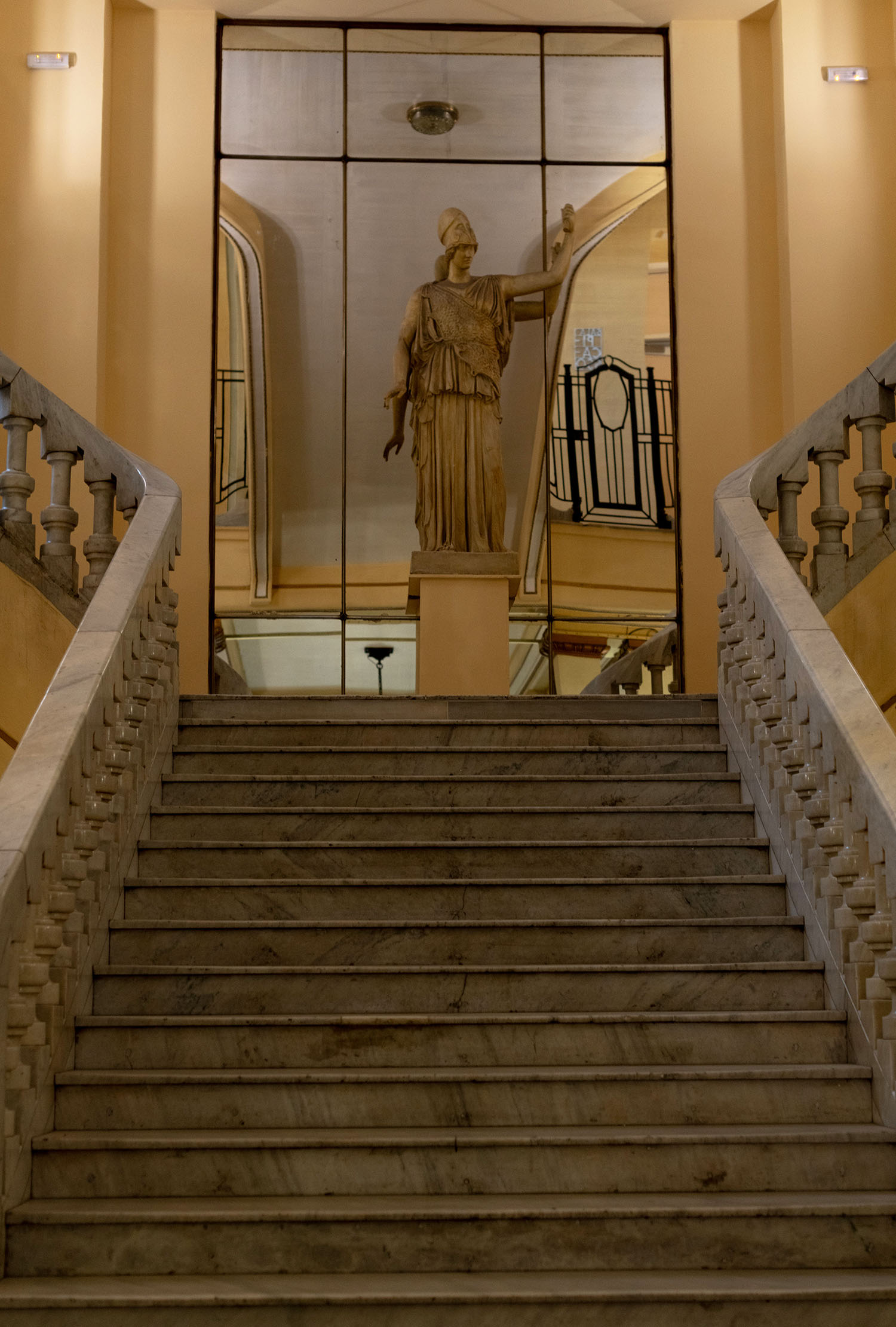 Coco & Voltaire - Marble staircase and statue in Circulo de Bellas Artes in Madrid