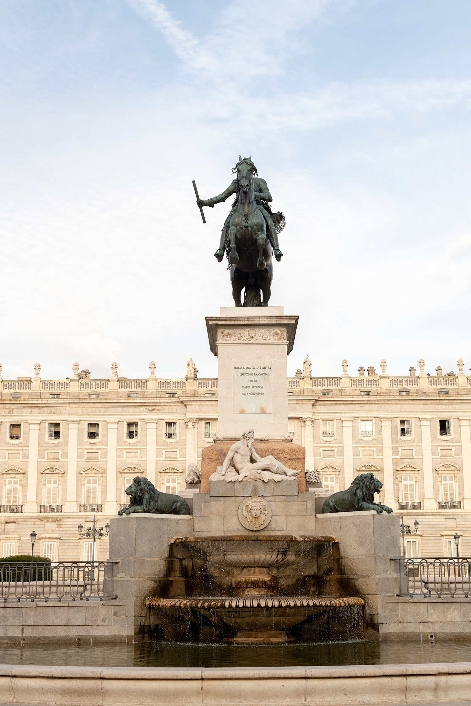 Coco & Voltaire - Palacio Real fountain in Madrid, Spain