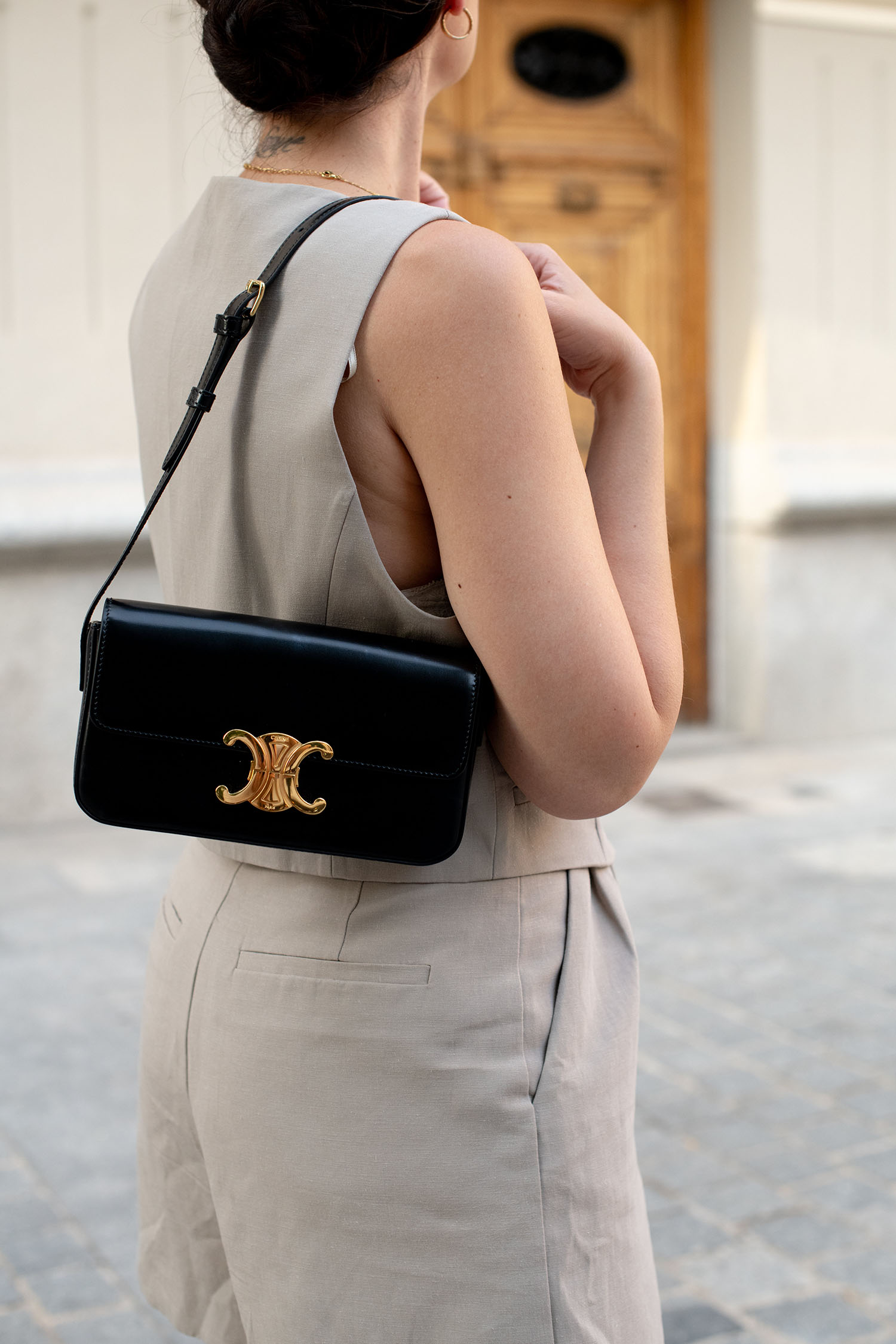 Coco & Voltaire - Celine Triomphe handbag, Zara shorts, Agape Studio necklace