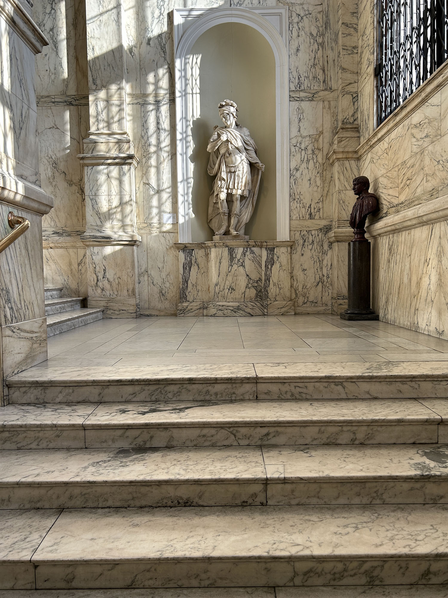 Coco & Voltaire - White marble staircase and statue at the Victoria and Albert Museum in London